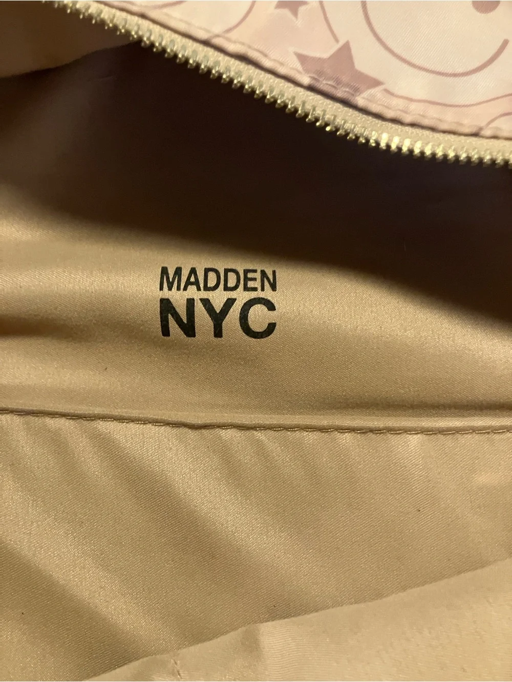 Madden NYC smiley faced back pack with gold hardware , beige & brown 9 pockets z
